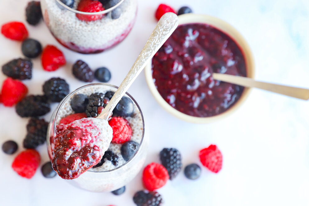 Berry chia seed pudding with a variety of fresh berries on top