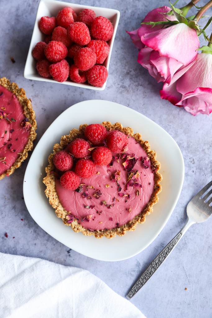 Fresh raspberry rose tarts with a vegan and gluten-free crust