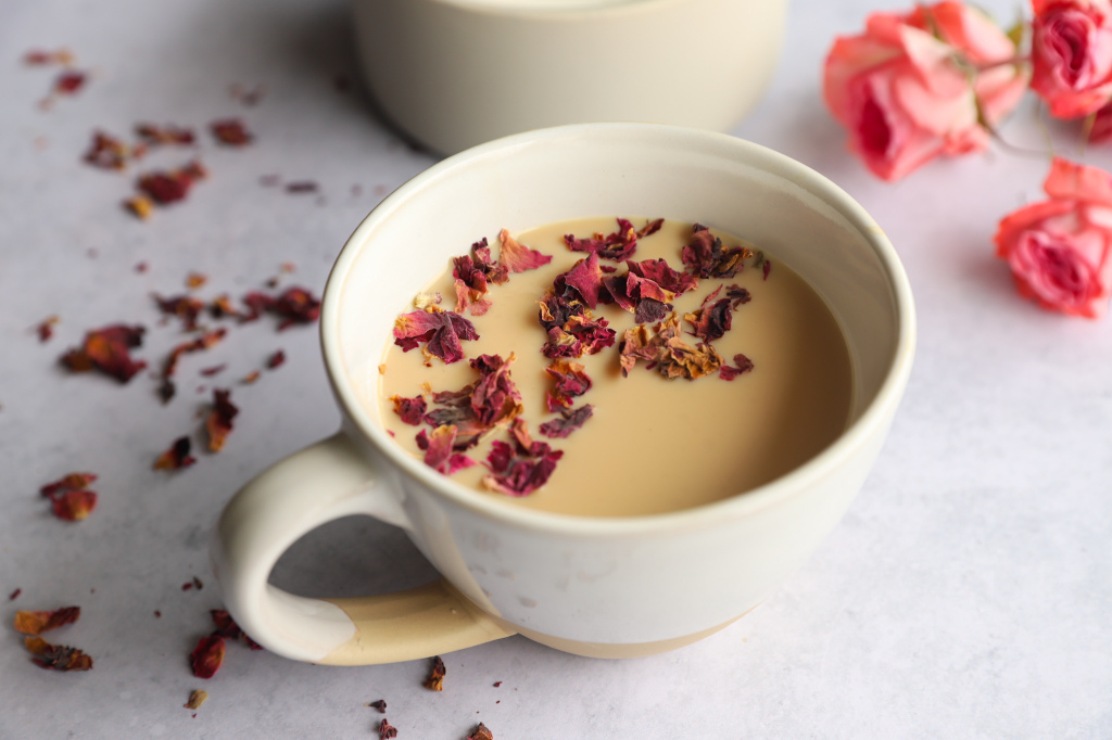 Warm virgin hot toddy with honey, lemon, and a star anise garnish