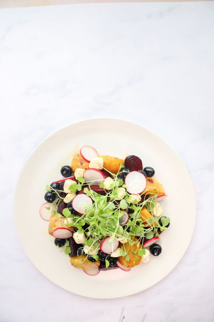 Blueberry beet salad with fresh golden and roasted beets, blueberries, and mozzarella