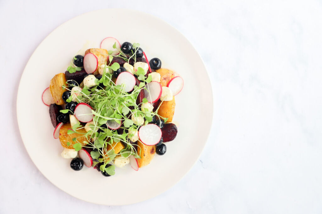 Blueberry beet salad with fresh golden and roasted beets, blueberries, and mozzarella