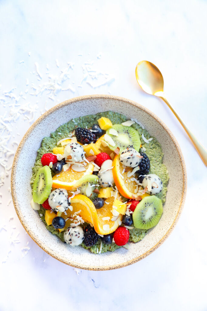 Coconut chia seed pudding bowl with mango and kiwi slices