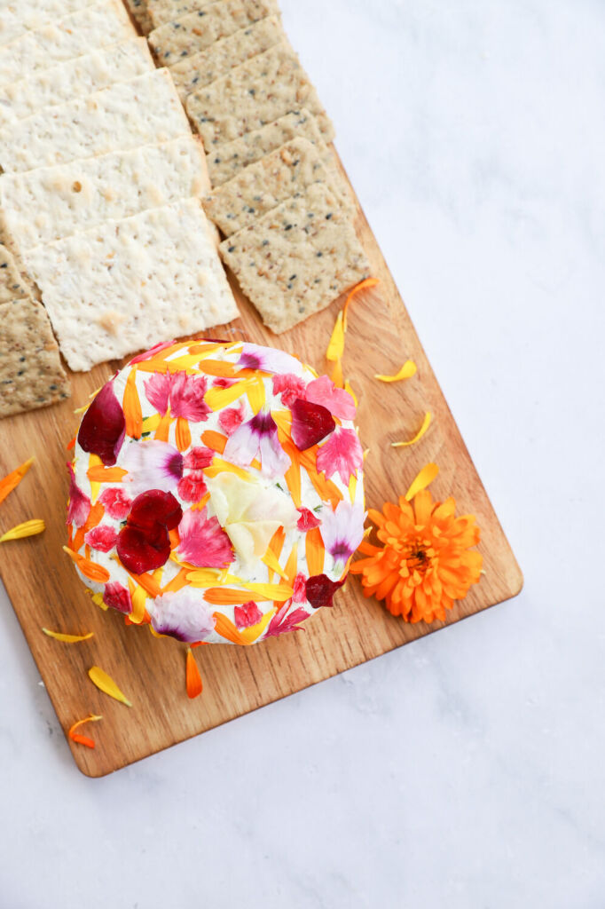 Garden party appetizer of floral herb goat cheese spread