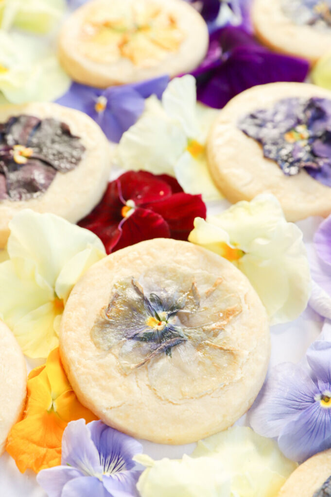 Gluten-free flower-pressed cookies adorned with edible flowers