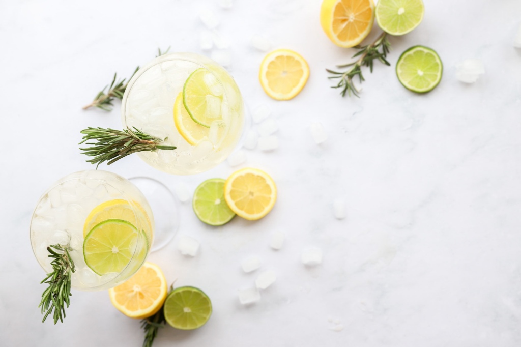 Elegant elderflower spritz mocktail garnished with fresh rosemary