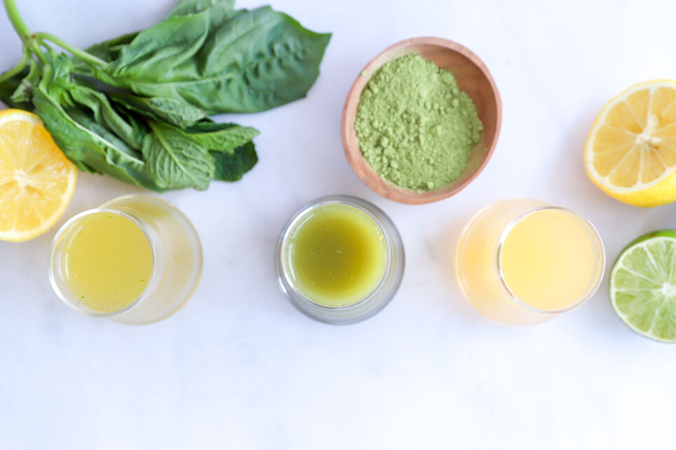 Trio of green tea shots: non-alcoholic, matcha, and mint, served in small glasses