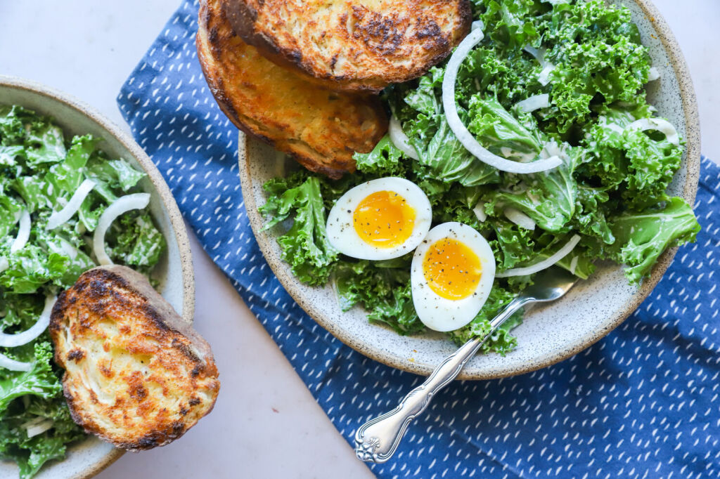 Kale Caesar salad with egg, Parmesan, and Greek yogurt dressing