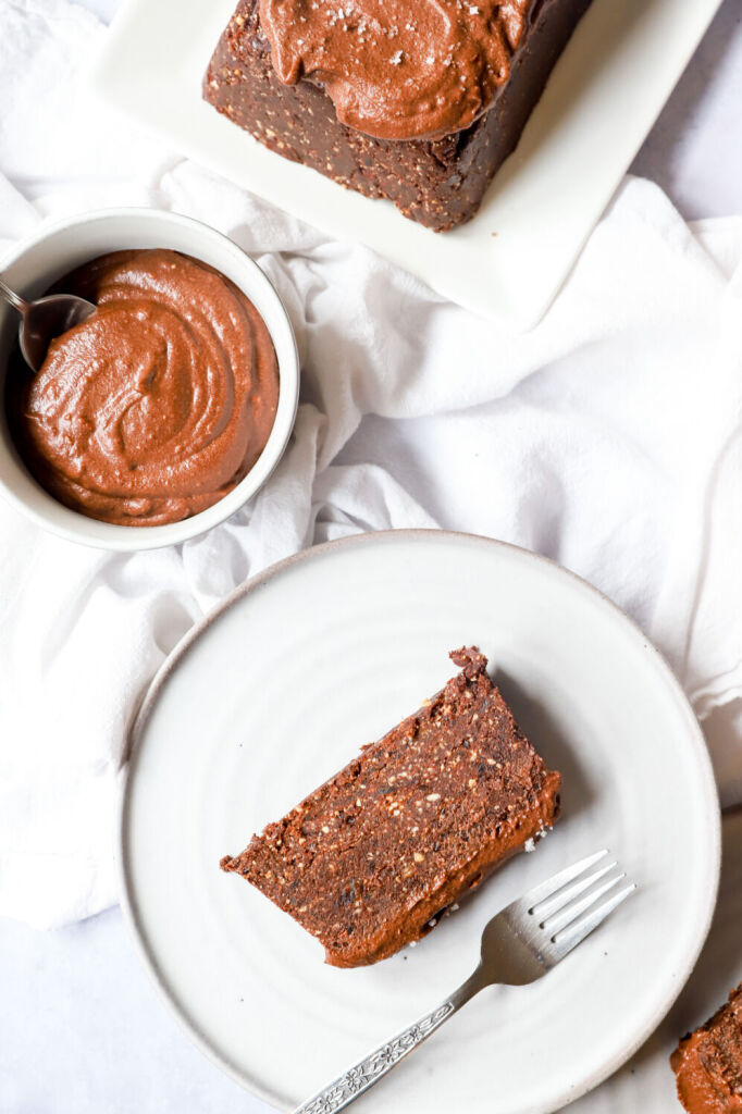 Gluten-free no-bake Nutella cake topped with hazelnuts