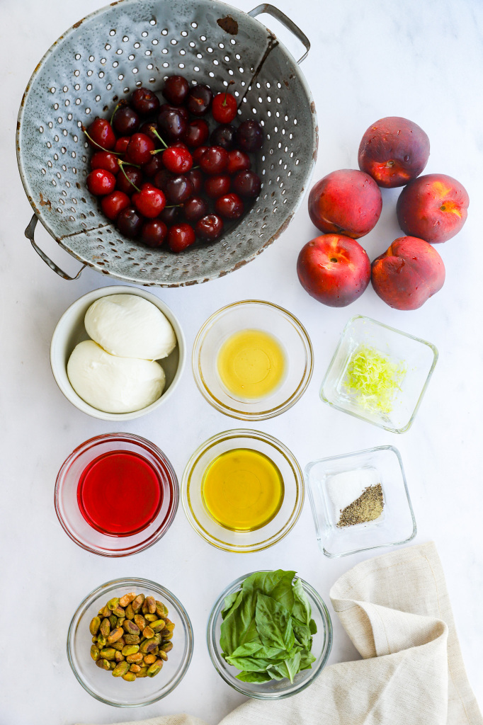 Portrait image of ingredients for Peach Caprese Salad with Cherries