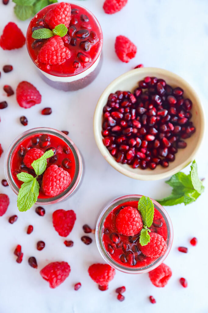 Pomegranate chia seed pudding parfait layered with yogurt and fresh pomegranate seeds