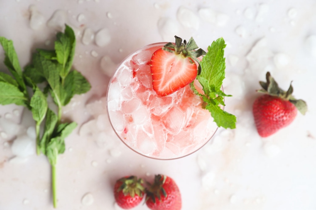 Home brewed strawberry kombucha mocktail with fresh ingredients