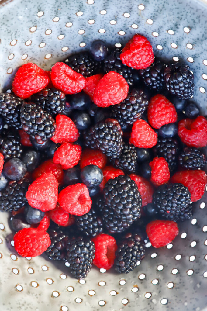 100 million berries chia seed pudding topped with fresh berries