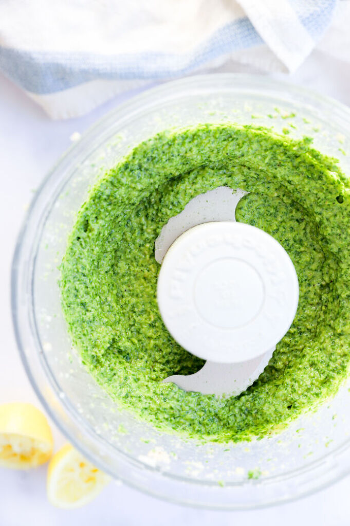 Gluten-free basil pesto sauce with pine nuts in a jar