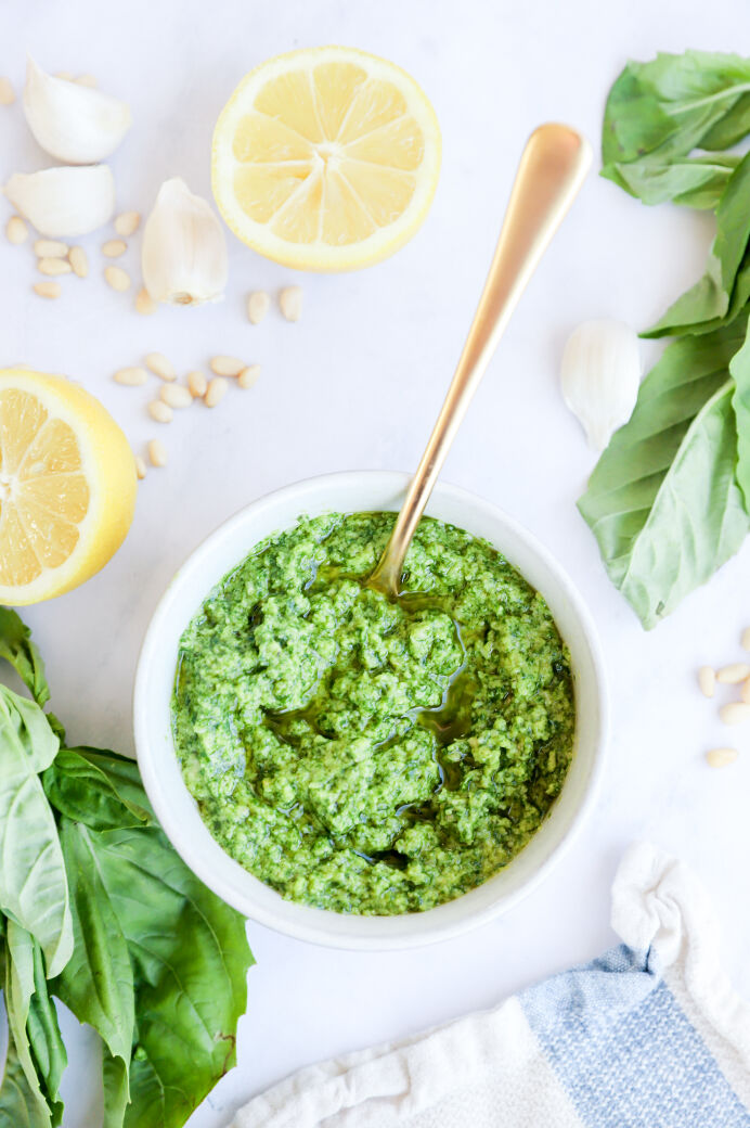 Nutrient-rich basil pesto with pine nuts in a small bowl