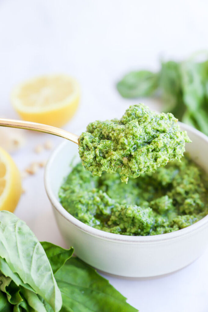 Creamy basil pesto sauce with pine nuts served with pasta