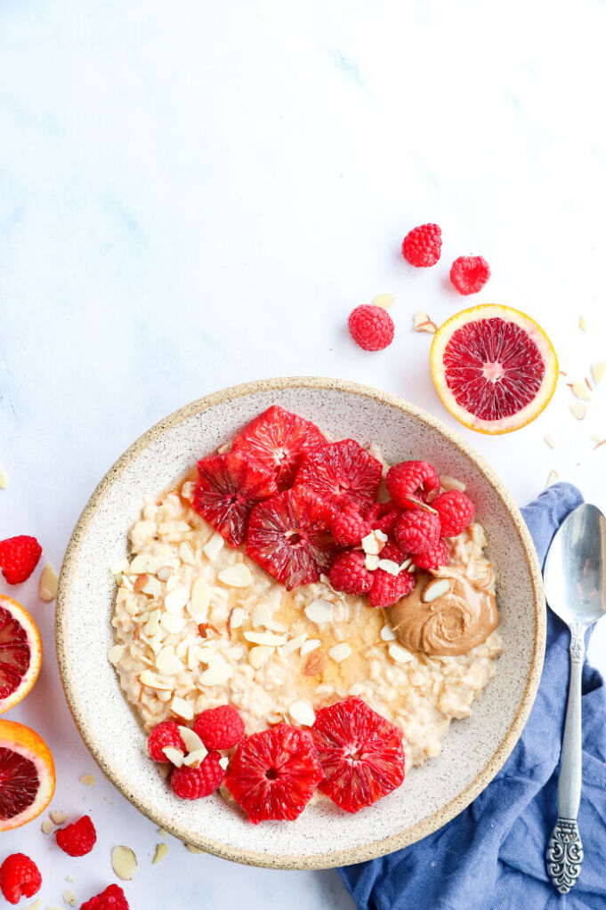 Blood orange oatmeal with fresh raspberries and almond butter