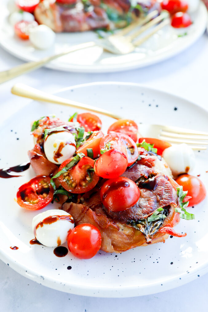 Italian caprese chicken saltimbocca with prosciutto and basil