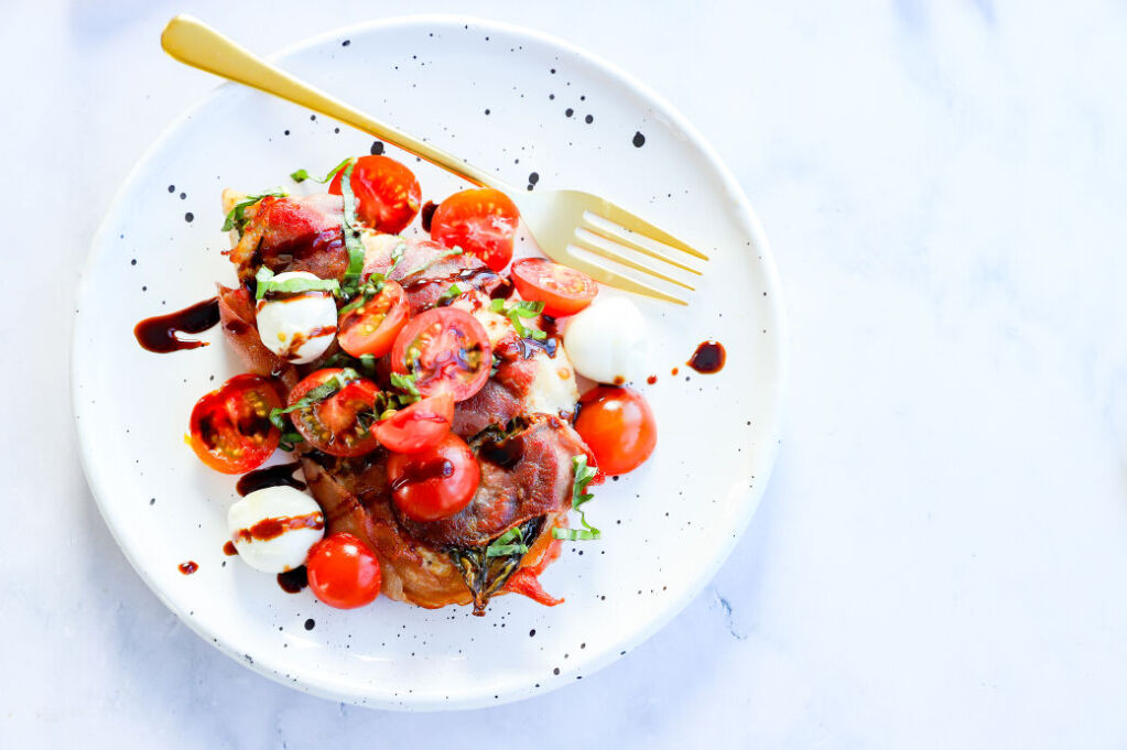 Best caprese chicken saltimbocca with chicken breast, prosciutto, and cheese