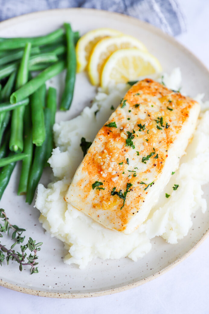 Halibut cooked in an air fryer with lemon thyme butter sauce