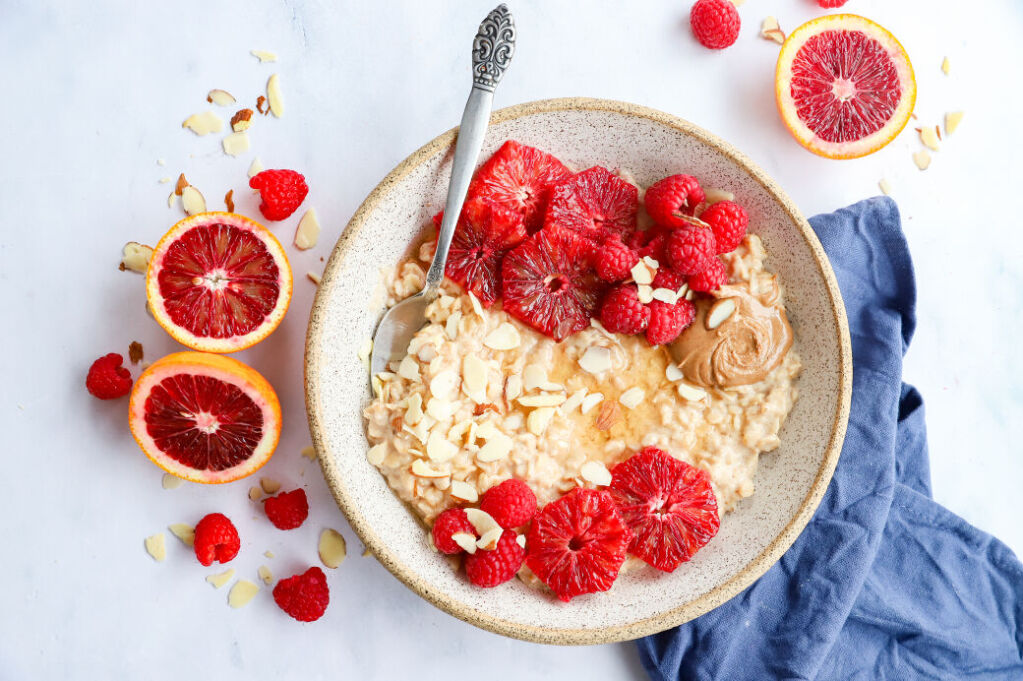 Blood orange oatmeal with fresh raspberries and almond butter