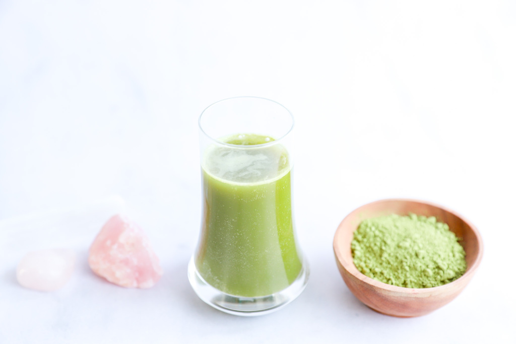 Healthy matcha green tea shot in a shot glass