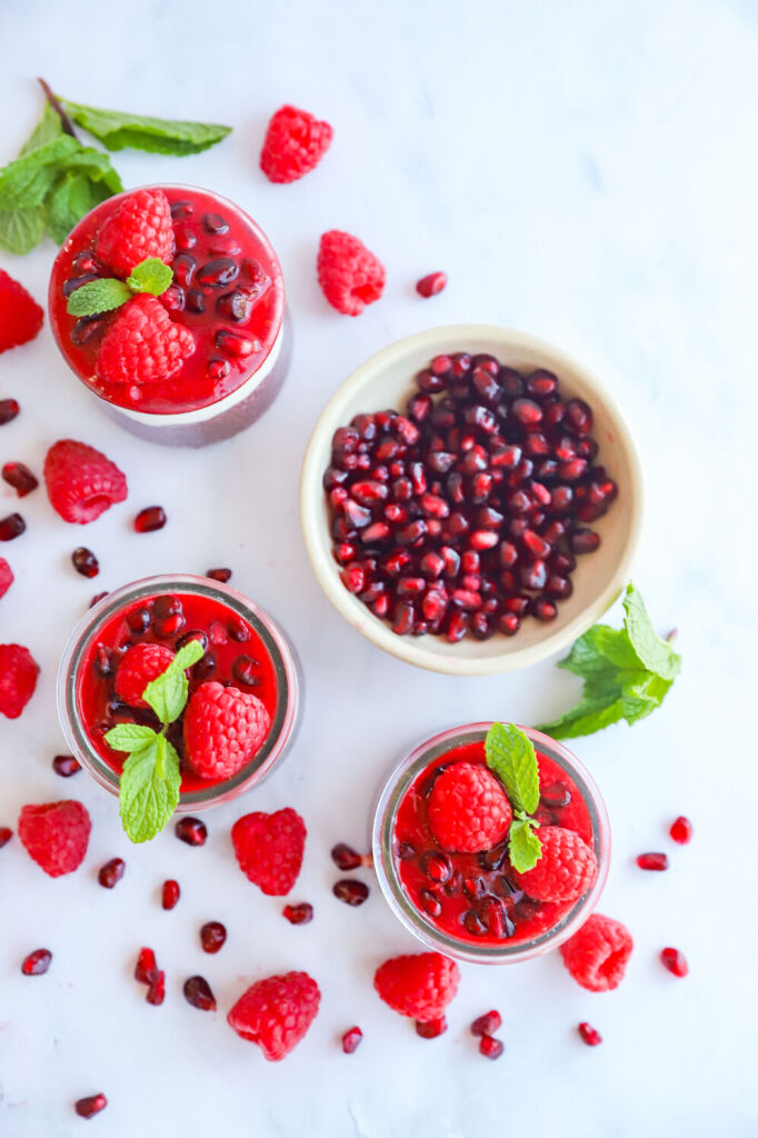 Pomegranate chia seed pudding parfait layered with yogurt and fresh pomegranate seeds