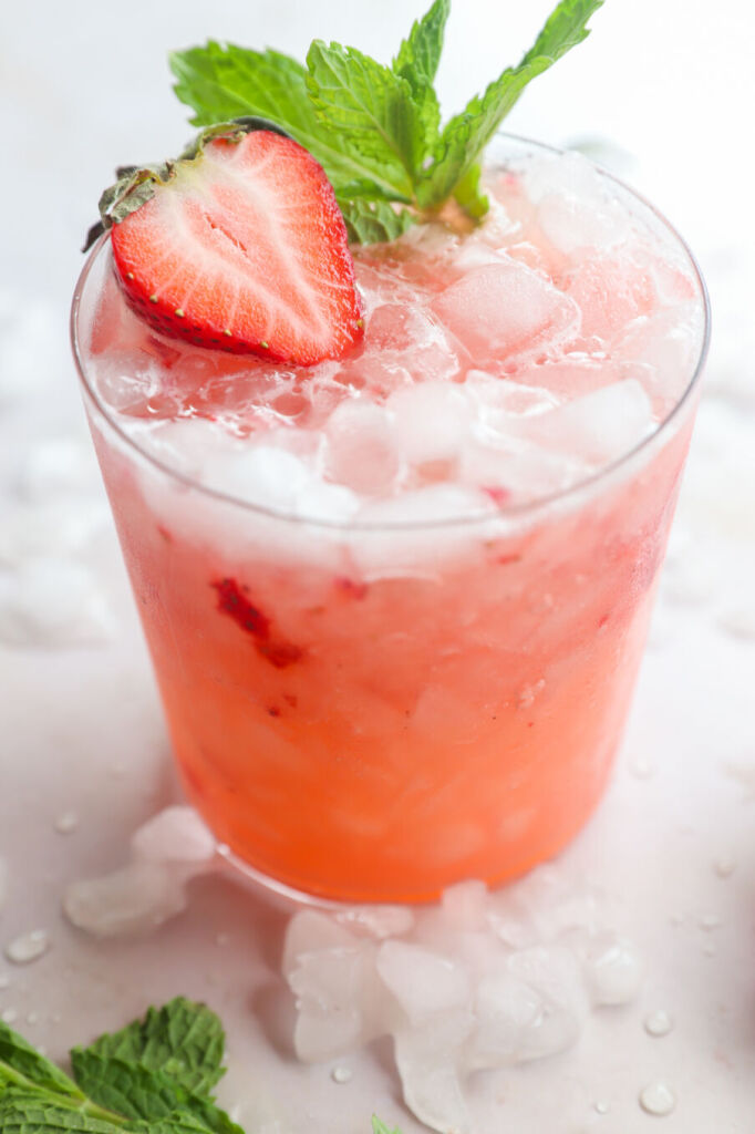 Home brewed strawberry kombucha mocktail with fresh ingredients