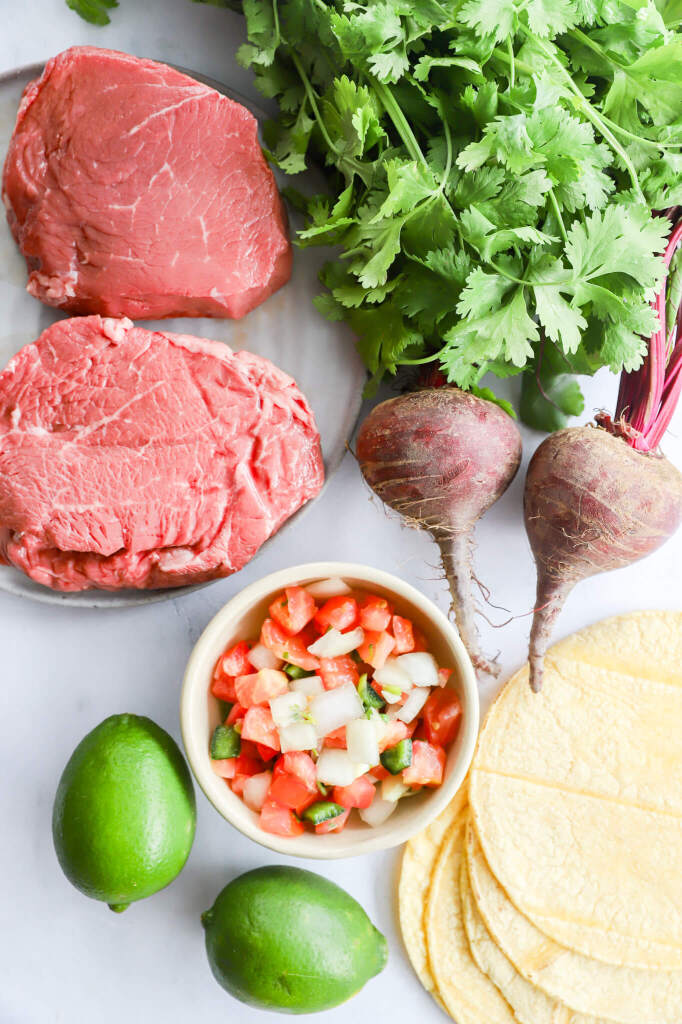 Beet and Beef Steak Tostadas garnished with fresh cilantro for hormone health