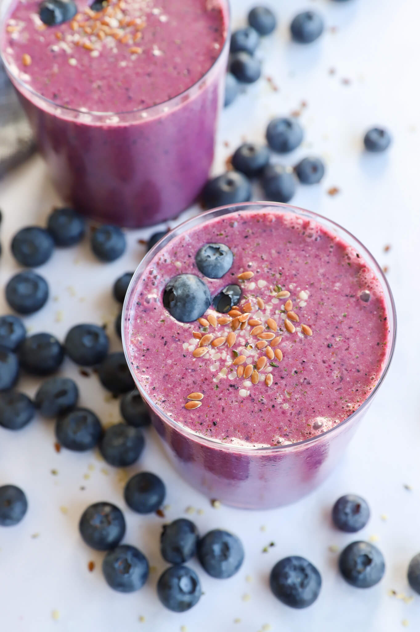 Estrogen detox banana beet smoothie with fresh ingredients in a glass