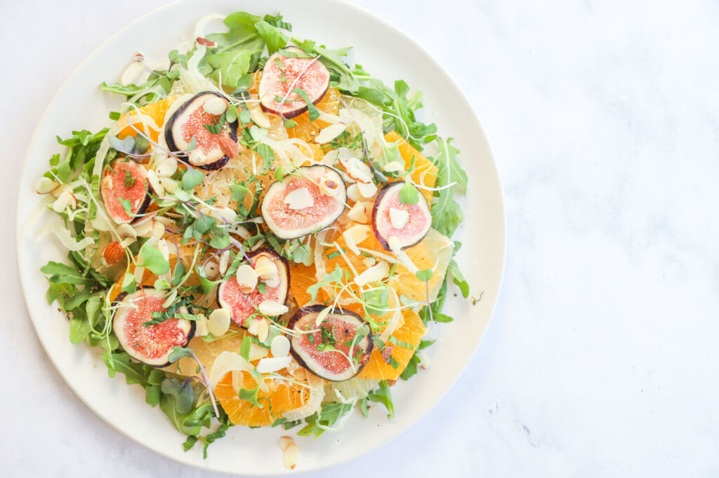 Refreshing citrus and microgreens salad with a variety of fresh citrus fruits