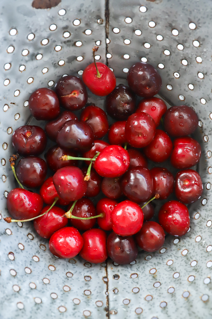 Portrait image of the preparation process for Peach Caprese Salad with Cherries