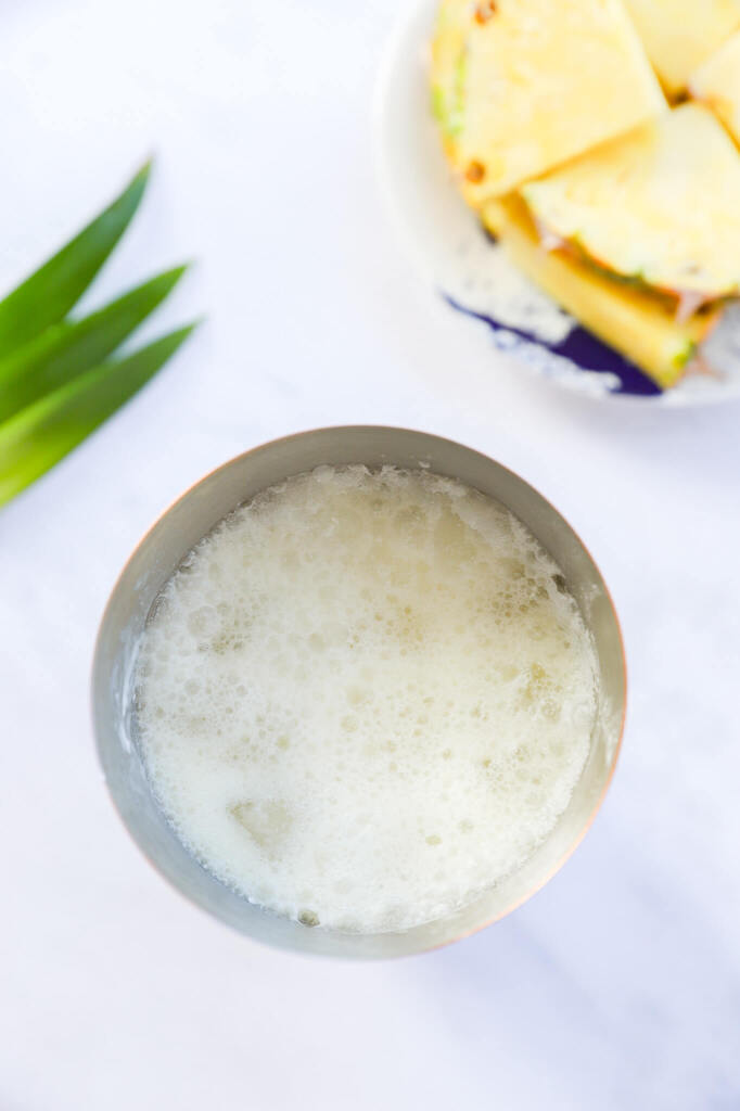 Nutrient-rich pineapple coconut water mocktail with fresh ingredients