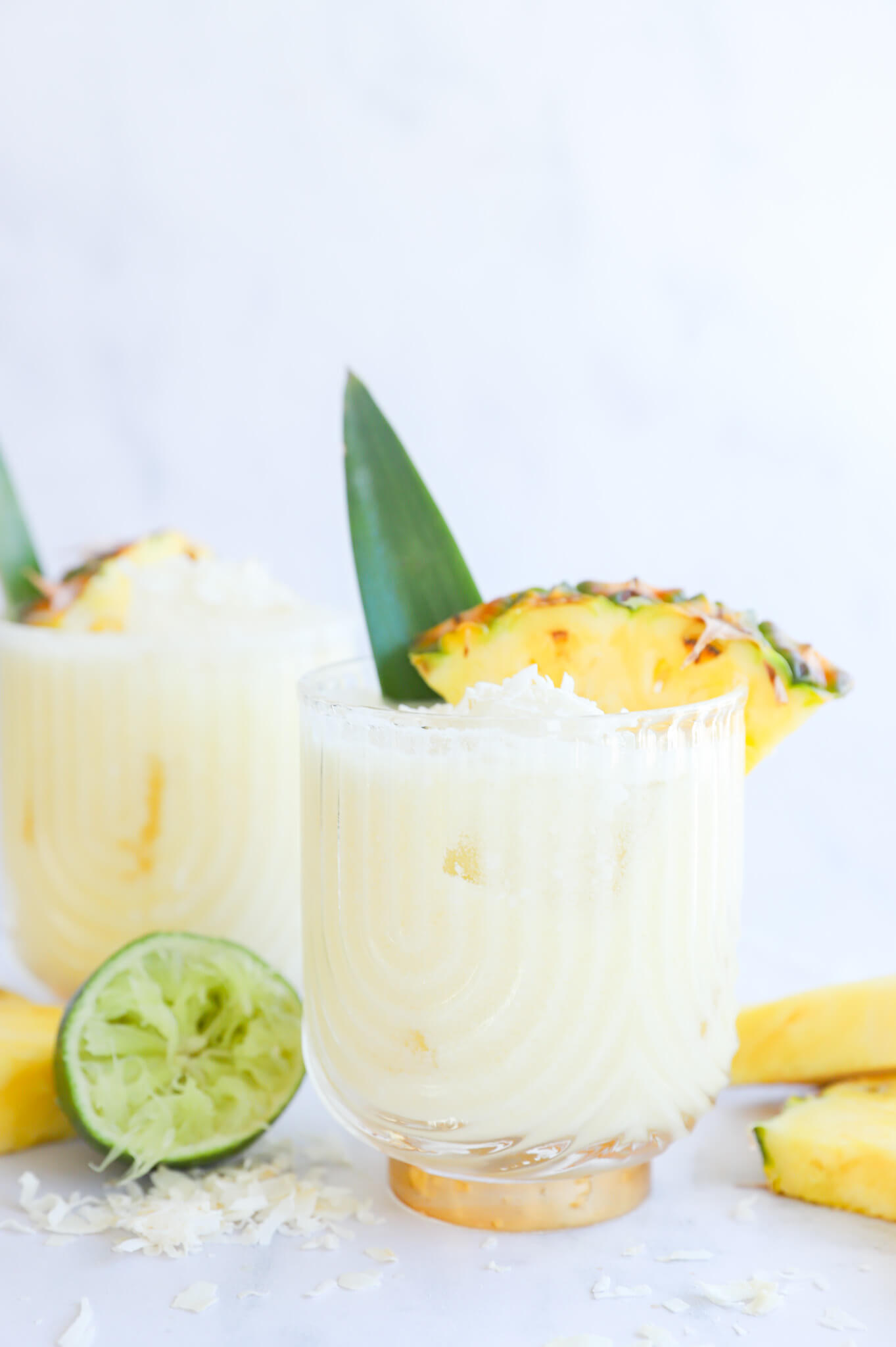 Refreshing pineapple coconut water mocktail with fresh pineapple slices