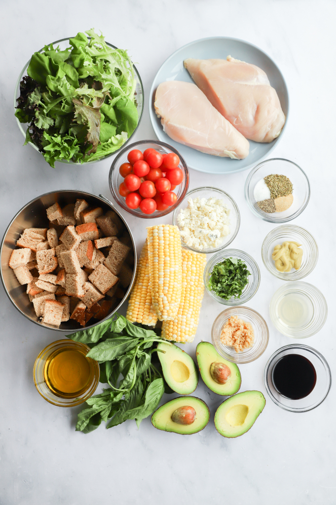 Portrait image of ingredients for Rustic Avocado and Corn Salad with Caprese Chicken