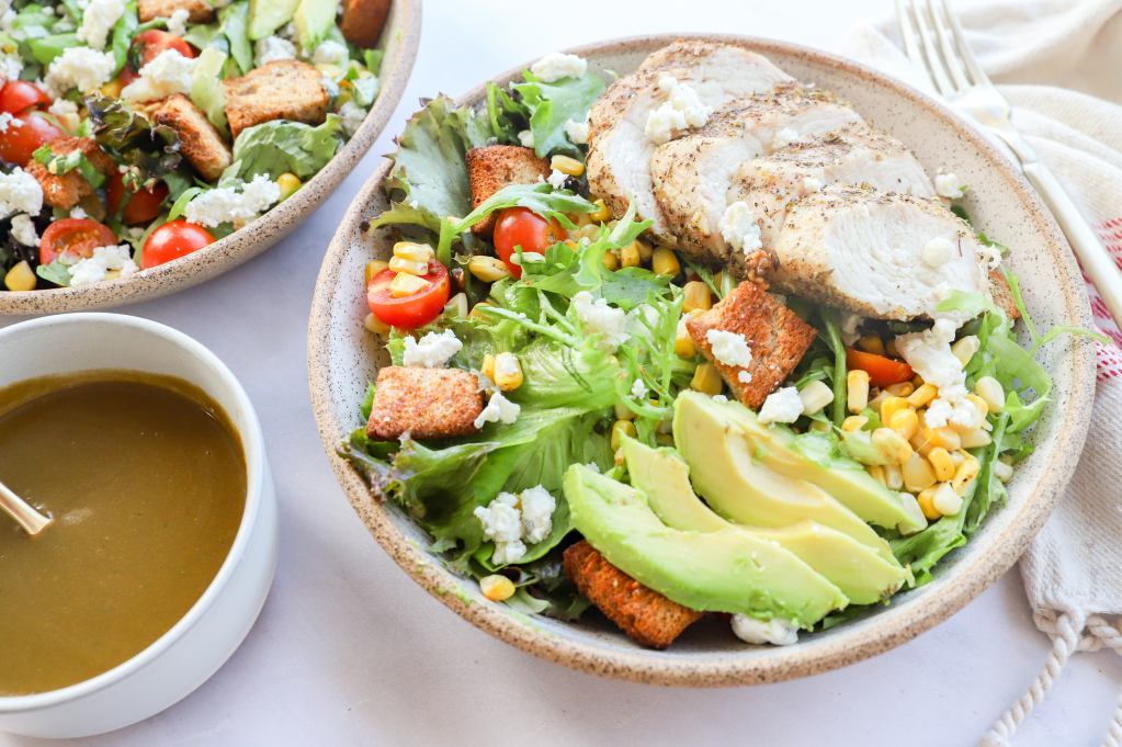 Landscape image of Rustic Avocado and Corn Salad with Caprese Chicken