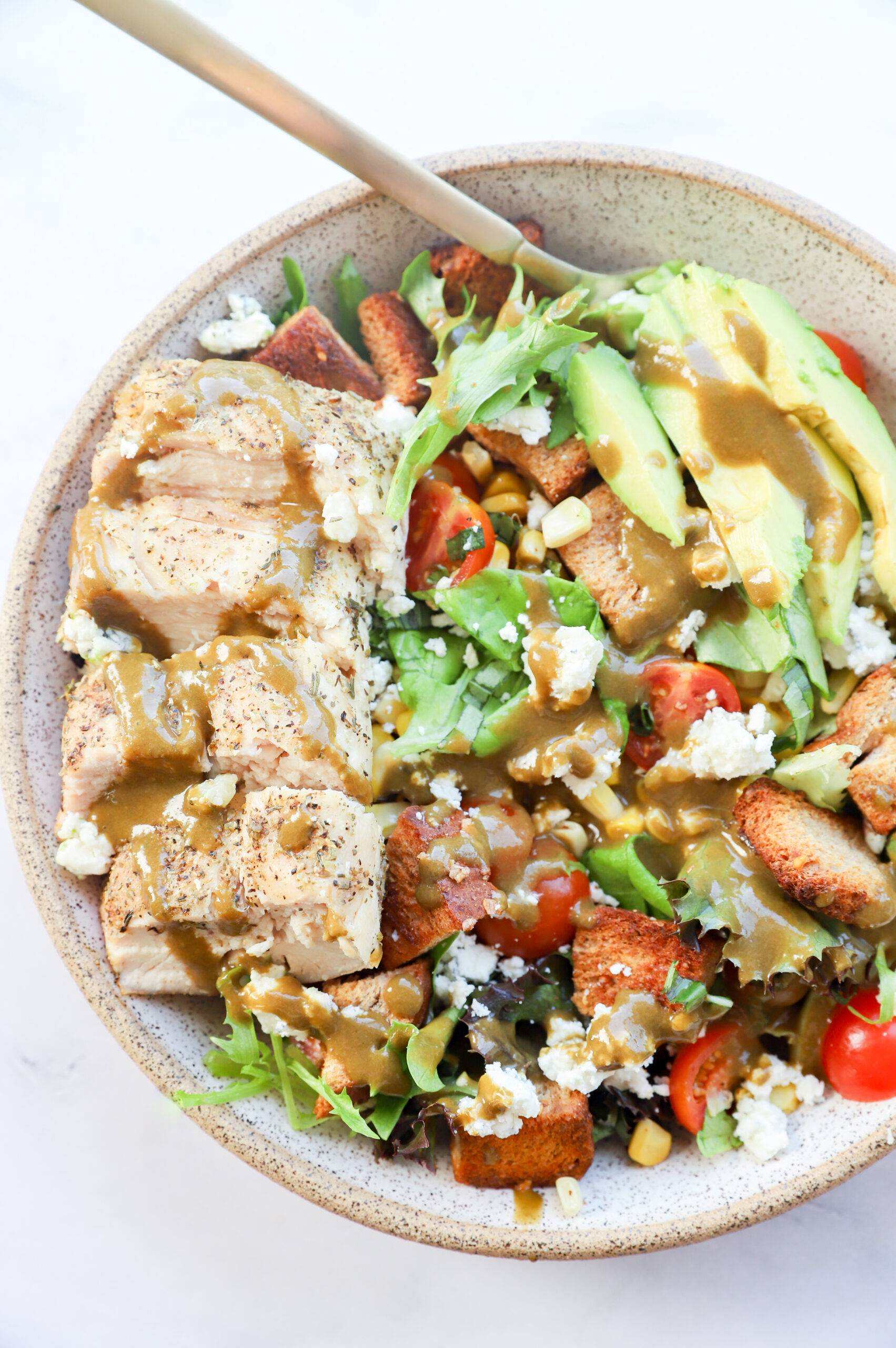 Portrait image of Rustic Avocado and Corn Salad with Caprese Chicken