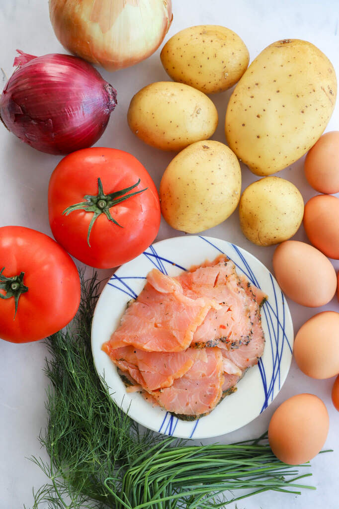 Nourishing smoked salmon eggs benedict on hashbrowns with poached eggs and hollandaise