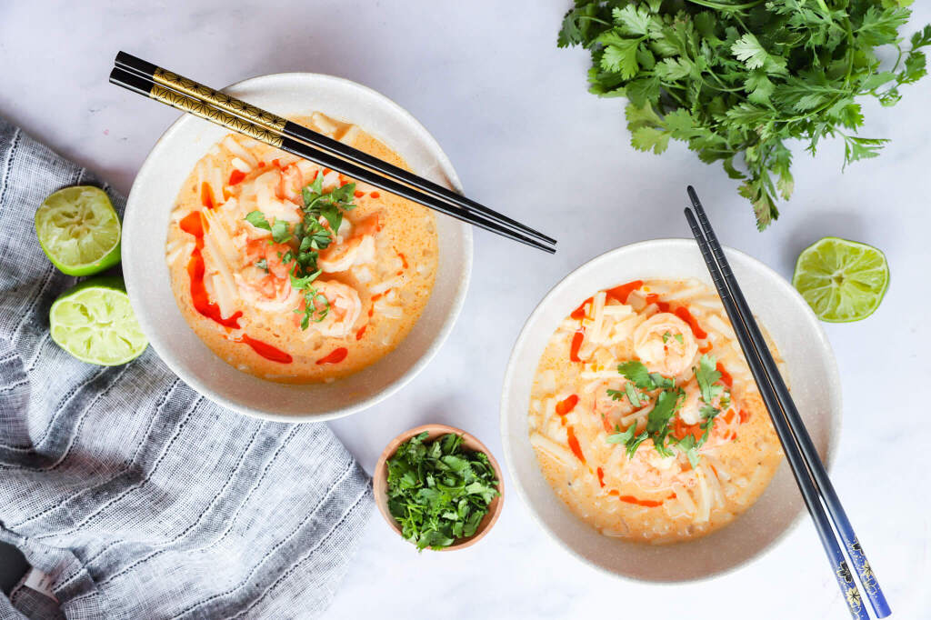 Hormone-balancing coconut curry soup with rice noodles, shrimp, and fresh lime